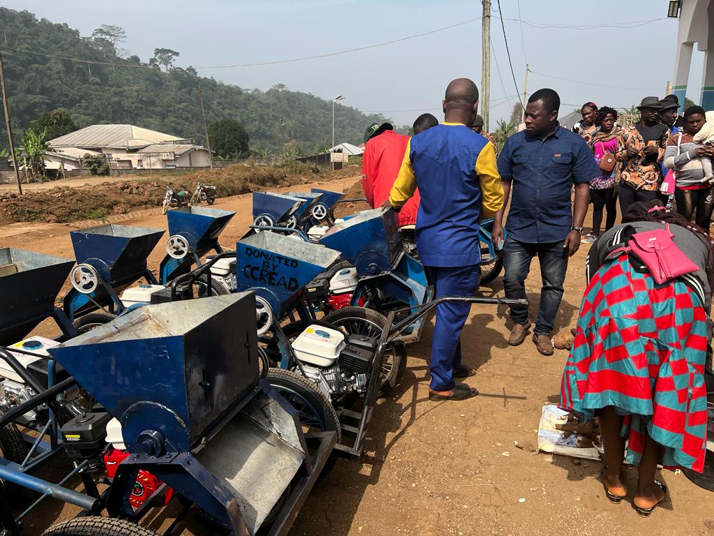 A line of Cassava processing machines is delivered to a village in Cameroon. Processing Cassava locally adds value to the product.