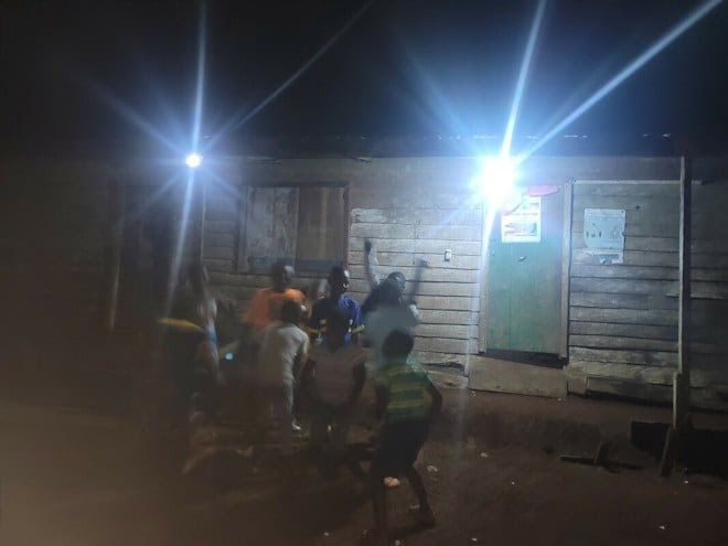 Solar power lights up communities like this and allows for play, study and quality time to continue after dark. 