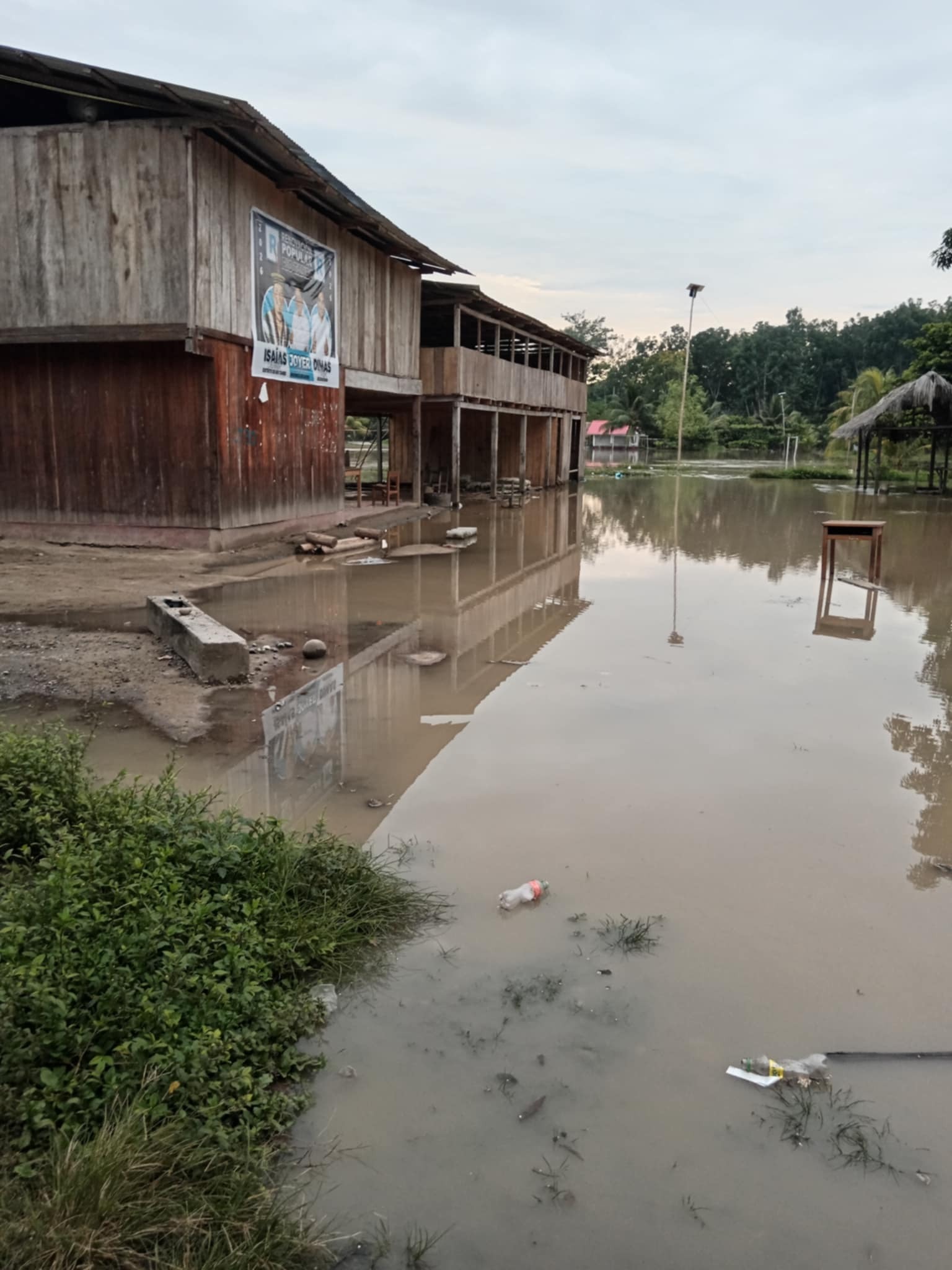 Images show the early effects of flooding on Ashaninka communities in the Amazon rainforest.