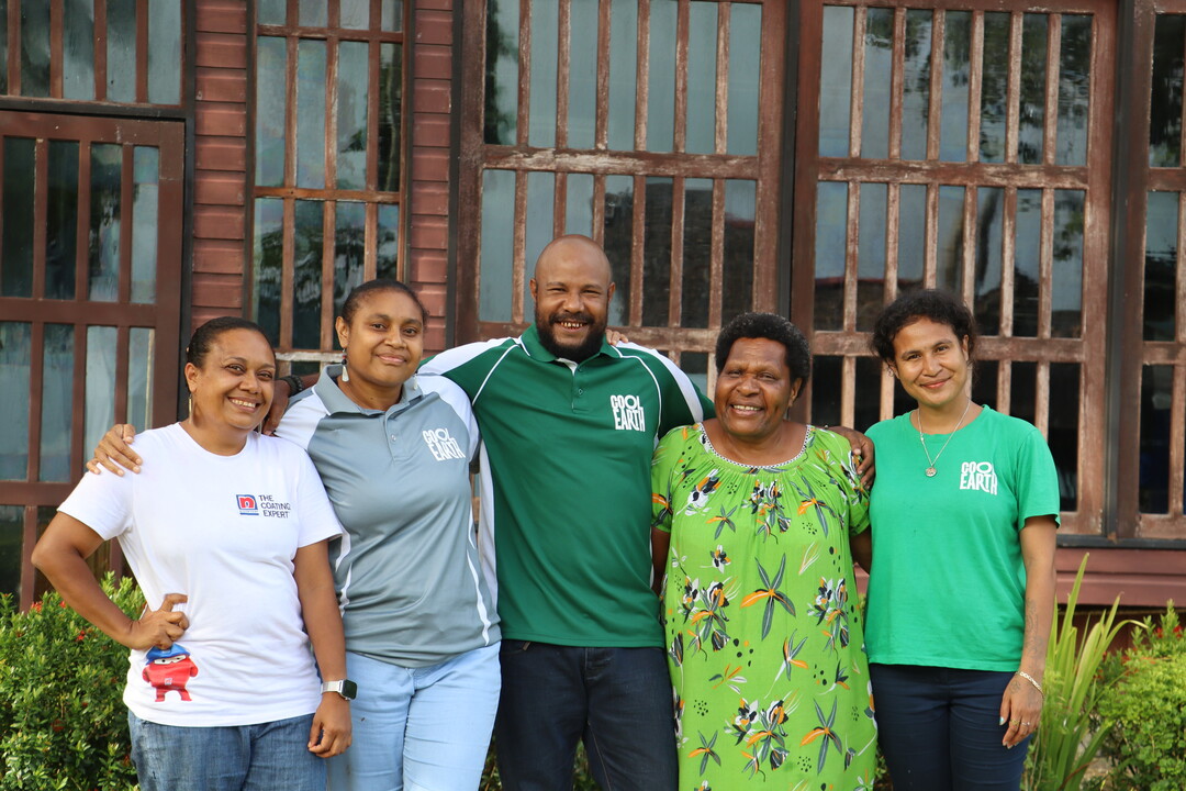 Regina and the Cool Earth Papua New Guinea team who work together to protect rainforest and support local communities.